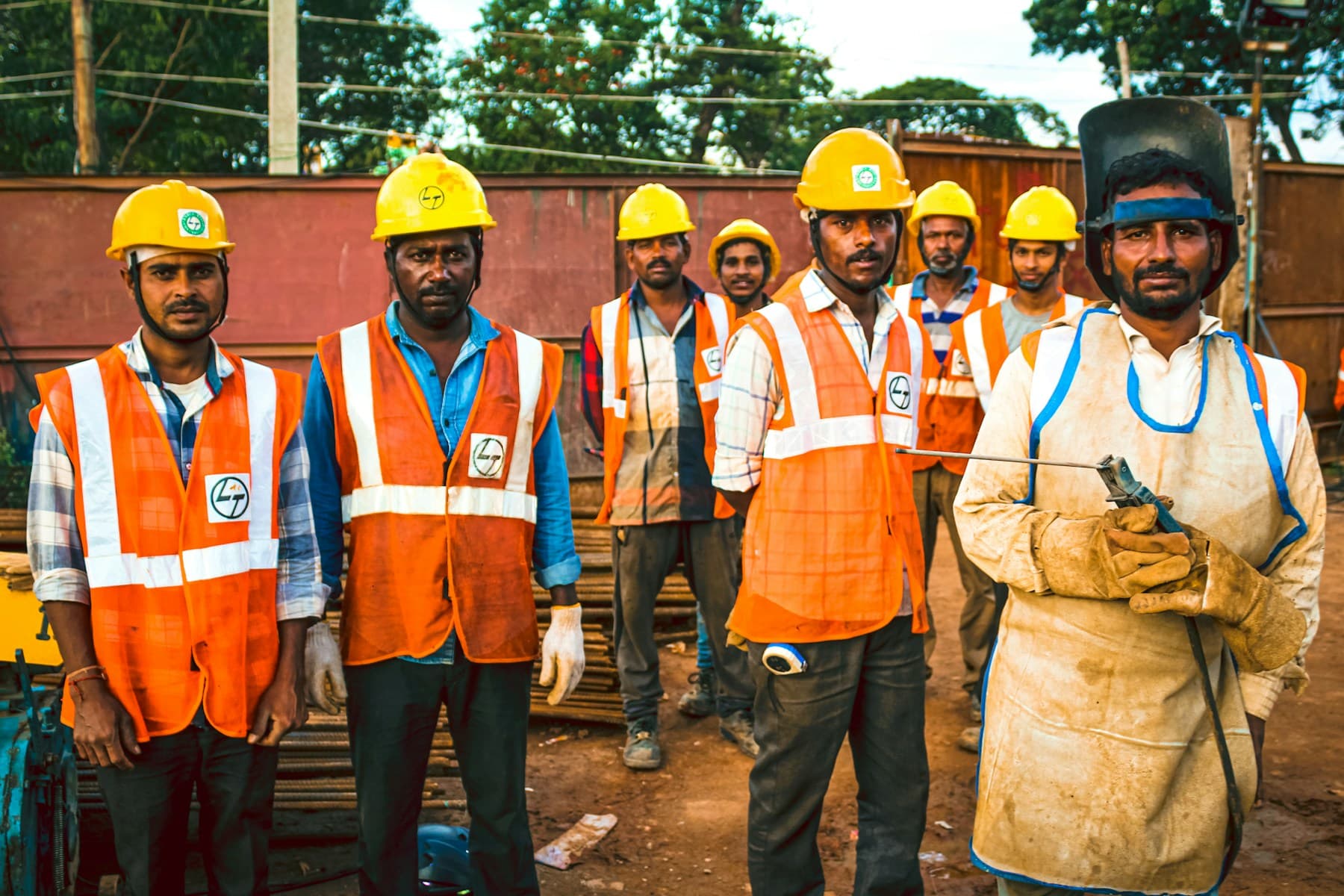 Field workers reviewing plans together